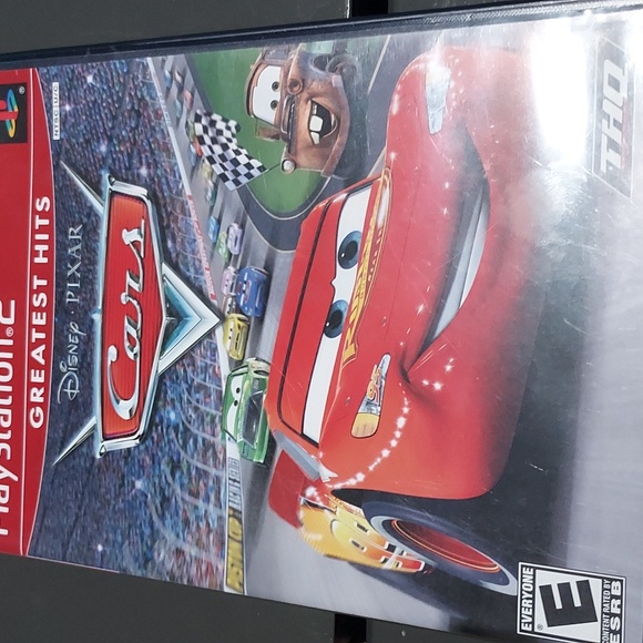 Disney Pixar Cars PS2 Game disc + Guide no scratches - Picture 1 of 4